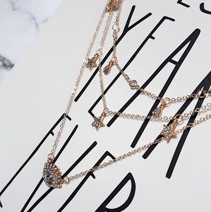 Gold Crystal Evil eye layered charm necklace